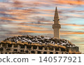 Historic Menuchehr Mosque with its minaret at sunset in Ani Ruins, Kars, Turkey Historic Menuchehr Mosque with its minaret at sunset in Ani Ruins, Kars, Turkey 140577921