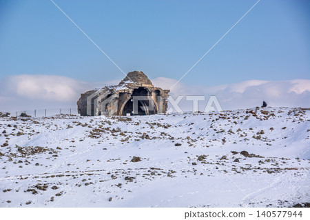 Ancient ruins of Gagkashen Church covered in snow at Ani Archaeological Site, Kars, Turkey 140577944