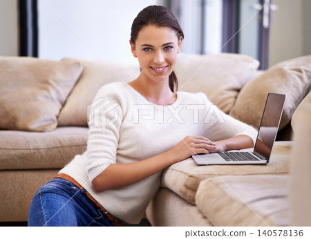 Woman, portrait and couch with laptop or online communication in apartment or streaming, download or browsing. Female person, face and technology at sofa in home connectivity, website or subscription Woman, portrait and couch with laptop or online communication in apartment or streaming, download or browsing. Female person, face and technology at sofa in home connectivity, website or subscription 140578136