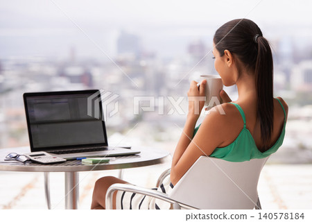 Woman, relax and laptop with coffee outdoor for research, budget or startup on balcony in city or urban. Rear view with female person for planning with tech, online and internet for web with mockup Woman, relax and laptop with coffee outdoor for research, budget or startup on balcony in city or urban. Rear view with female person for planning with tech, online and internet for web with mockup 140578184