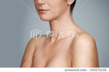 Shoulder, skin and cropped face of woman for skincare, anti aging and beauty isolated on gray background. Female person, lady and body for wellness, natural tones and feminine care in studio Shoulder, skin and cropped face of woman for skincare, anti aging and beauty isolated on gray background. Female person, lady and body for wellness, natural tones and feminine care in studio 140578298