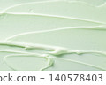 Aloe vera or green tea beauty face cream texture. Green cosmetic lotion background. Organic shampoo texture smudge. Cleansing cosmetic product. Natural herbal skincare texture. 140578403