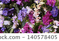 Background of various orchid flowers in different colors. Elegant orchid floral composition with exotic blooms and vibrant natural beauty. 140578405