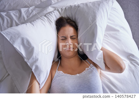 Bed, insomnia and woman frustrated with sleeping with anxiety, restless and unhappy on soft mattress. Apartment, home and female person depressed with mental health in bedroom of house at night 140578427