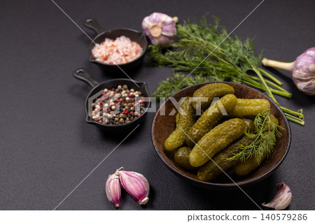 Pickled cucumbers with dill, garlic, salt and peppercorns Pickled cucumbers with dill, garlic, salt and peppercorns 140579286