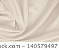 Smooth elegant golden silk or satin luxury cloth texture as wedding background. Luxurious background design. In Sepia toned. Retro style 140579497