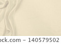 Smooth elegant golden silk or satin luxury cloth texture as wedding background. Luxurious Christmas background or New Year background design. In Sepia toned. Retro style 140579502