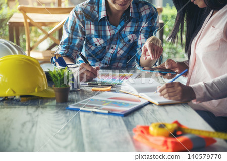 construction business plan deconstruction team consulting partnership. Construction engineer teamwork Safety Suit Trust Team implement honest planning in Construction Site. Trustworthy engineer team. 140579770