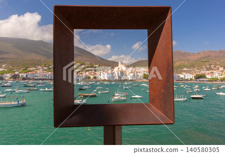 Harbor View Framed by Viewing Frame and Boats in Cadaques Spain 140580305