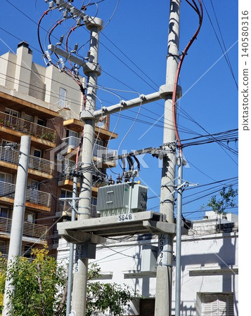 Urban power distribution network with transformer and utility lines Urban power distribution network with transformer and utility lines 140580316