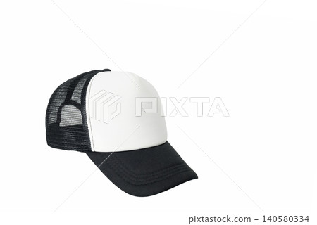 black and white trucker cap with mesh back turned to the left side on isolated white background 140580334
