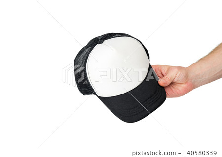 baseball cap in a man hand on a white background 140580339