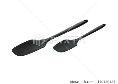 set of two silicone spatulas of black color on a white background set of two silicone spatulas of black color on a white background 140580381