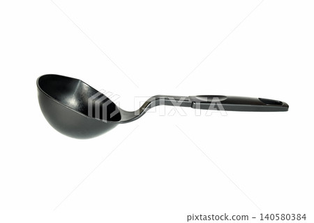 black plastic kitchen ladle with a comfortable handle lies horizontally on a clean white background black plastic kitchen ladle with a comfortable handle lies horizontally on a clean white background 140580384