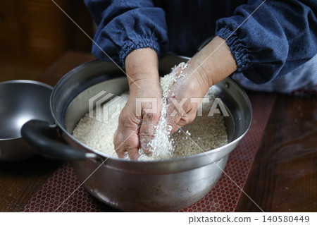 A woman making miso A woman making miso 140580449