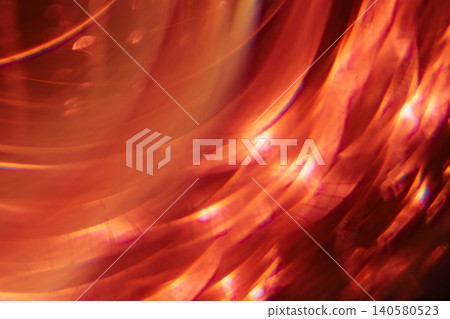 Abstract close-up image of swirling orange and red light patterns creating a vibrant, dynamic visual effect with a smooth gradient and soft focus Abstract close-up image of swirling orange and red light patterns creating a vibrant, dynamic visual effect with a smooth gradient and soft focus 140580523