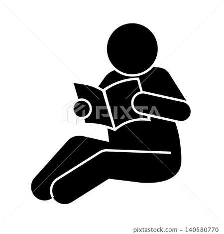 Silhouette of a person sitting on the floor reading a book 140580770