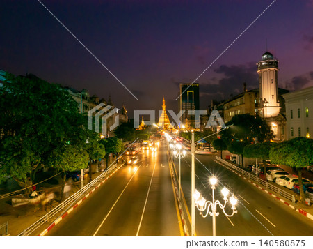 Streets of downtown Yangon on the road to Sule Pagoda time lapse with traffic jam and modern city Streets of downtown Yangon on the road to Sule Pagoda time lapse with traffic jam and modern city 140580875