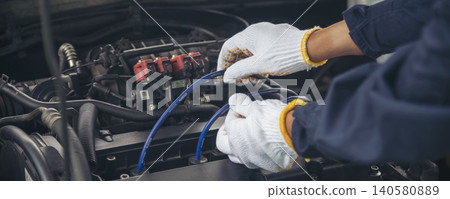 Banner Mechanic man hands repairing car shop. Man hands fixing Car machinery vehicle mechanical service. Panorama open vehicle hood checking up auto mobile. Car maintenance engineer with copy sapce Banner Mechanic man hands repairing car shop. Man hands fixing Car machinery vehicle mechanical service. Panorama open vehicle hood checking up auto mobile. Car maintenance engineer with copy sapce 140580889