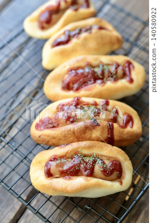 Gluten-free sausage bread made with rice flour bagel dough Gluten-free sausage bread made with rice flour bagel dough 140580922