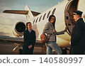 Luxury business travel with a female executive boarding a private jet during golden hour 140580997