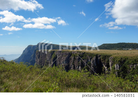 Breathtaking view of Fortaleza canyon in Cambara do Sul, RS, Brazil, in the morning. Panoramic Breathtaking view of Fortaleza canyon in Cambara do Sul, RS, Brazil, in the morning. Panoramic 140581031