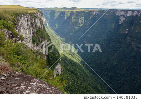 amazing view of Fortaleza canyon in Cambara do Sul, RS, Brazil, at daytime. Panoramic amazing view of Fortaleza canyon in Cambara do Sul, RS, Brazil, at daytime. Panoramic 140581033