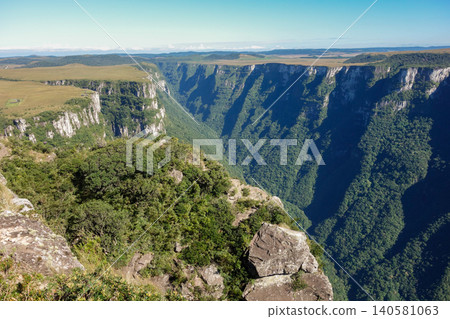 Breathtaking view of Fortaleza canyon in Cambara do Sul, RS, Brazil, in the morning. Panoramic Breathtaking view of Fortaleza canyon in Cambara do Sul, RS, Brazil, in the morning. Panoramic 140581063