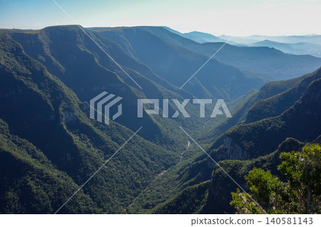 magnificent Fortaleza canyon illuminated by morning sun. Cambara do Sul, RS, Brazil. magnificent Fortaleza canyon illuminated by morning sun. Cambara do Sul, RS, Brazil. 140581143