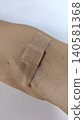 Bandage after injection 140581368
