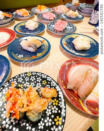 Fresh conveyor belt sushi from Kushiro, Hokkaido Fresh conveyor belt sushi from Kushiro, Hokkaido 140581590