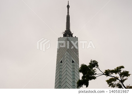 Fukuoka Tower soaring against the cloudy sky Fukuoka Tower soaring against the cloudy sky 140581987
