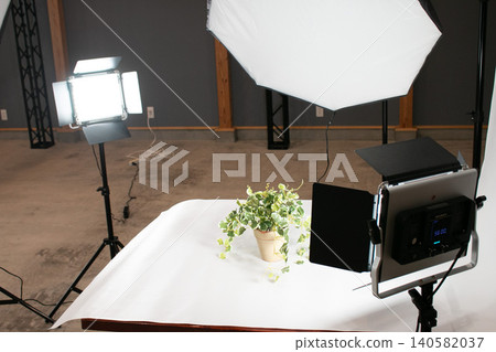 A scene of photographing objects in a studio; a creative image. A scene of photographing objects in a studio; a creative image. 140582037