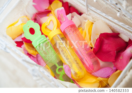 Image of colorful soap bubbles and flower petals Image of colorful soap bubbles and flower petals 140582333