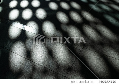 Background material, blurring material, geometric circular light and shadows reflected on a stone floor - Image 140582350
