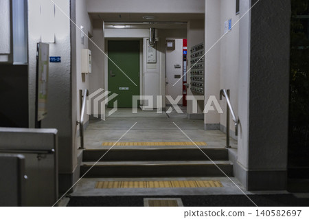 Entrance to a newly built apartment complex at night Entrance to a newly built apartment complex at night 140582697