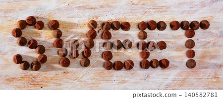Word Sweet lined with chocolate truffles Word Sweet lined with chocolate truffles 140582781