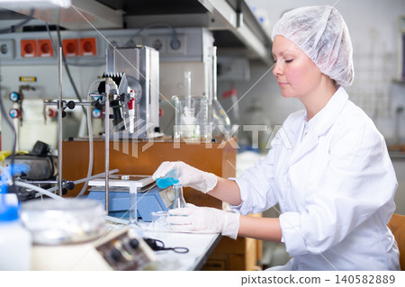 Shot of an adult woman using equipment to work in a laboratory Shot of an adult woman using equipment to work in a laboratory 140582889