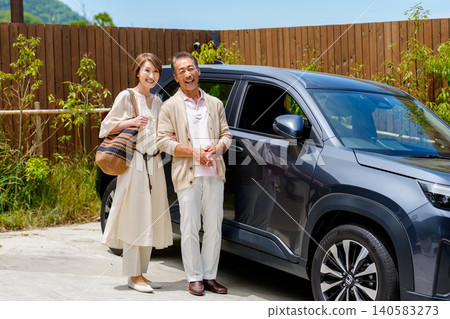 A smiling senior couple going out in their car. A smiling senior couple going out in their car. 140583273