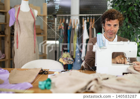 Man tailor at work 140583287