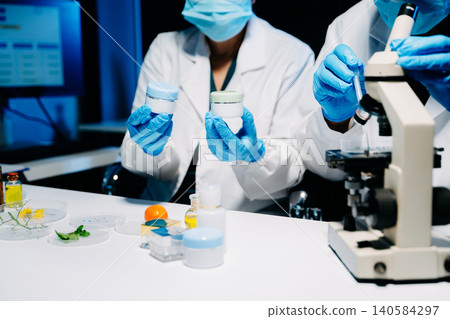 Professional skincare laboratory researching cosmetic cream and serum. Beauty science, dermatology, skincare innovation, product testing Professional skincare laboratory researching cosmetic cream and serum. Beauty science, dermatology, skincare innovation, product testing 140584297