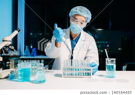 Scientist using a micropipette to handle samples in a modern laboratory, showcasing biotech research, medical diagnostics, and scientific innovation. Scientist using a micropipette to handle samples in a modern laboratory, showcasing biotech research, medical diagnostics, and scientific innovation. 140584485