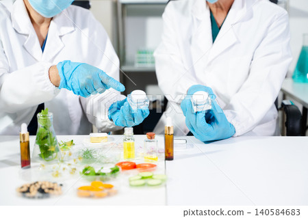 Cosmetic lab testing skincare products with natural ingredients, advanced science, and clean beauty innovation Cosmetic lab testing skincare products with natural ingredients, advanced science, and clean beauty innovation 140584683