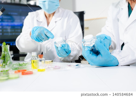 Cosmetic lab testing skincare products with natural ingredients, advanced science, and clean beauty innovation Cosmetic lab testing skincare products with natural ingredients, advanced science, and clean beauty innovation 140584684