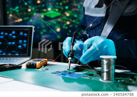 Professional technician soldering PCB circuit board with precision tools in electronics lab, showcasing hardware engineering, manufacturing, repair Professional technician soldering PCB circuit board with precision tools in electronics lab, showcasing hardware engineering, manufacturing, repair 140584786