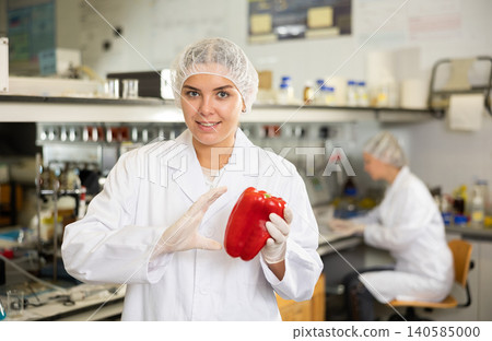 Woman scientist working in food testing laboratory Woman scientist working in food testing laboratory 140585000