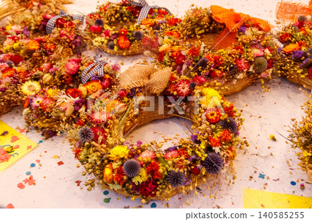 Dried flowers arranged in a beautiful wreaths 140585255