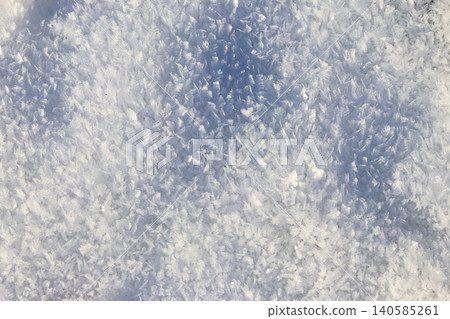 Texture of the white snow. Winter background Texture of the white snow. Winter background 140585261