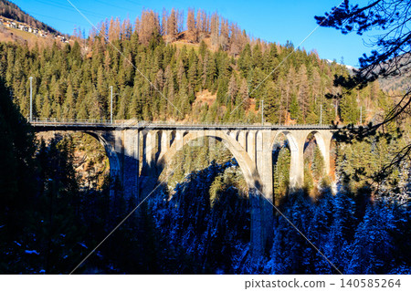 View of Wiesen Viaduct, Rhaetian railway, Graubunden in Switzerland at winter View of Wiesen Viaduct, Rhaetian railway, Graubunden in Switzerland at winter 140585264