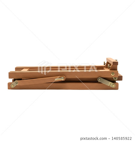 Folded Wooden Easel on Black Background, Art Studio Equipment 140585922